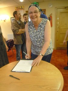 Lorraine signing the FTNCG Constitution