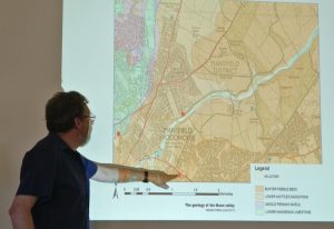 Stephen showing the geology of the Maun Valley